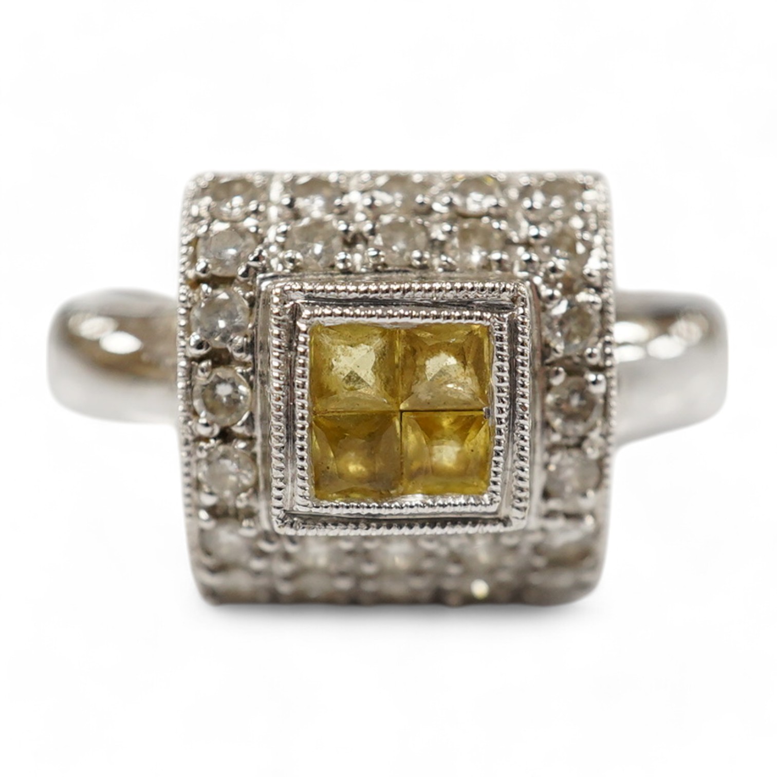 A modern 18ct white gold, yellow sapphire and diamond chip set square cluster ring, size N/O, gross weight 5.1 grams. Condition - fair to good